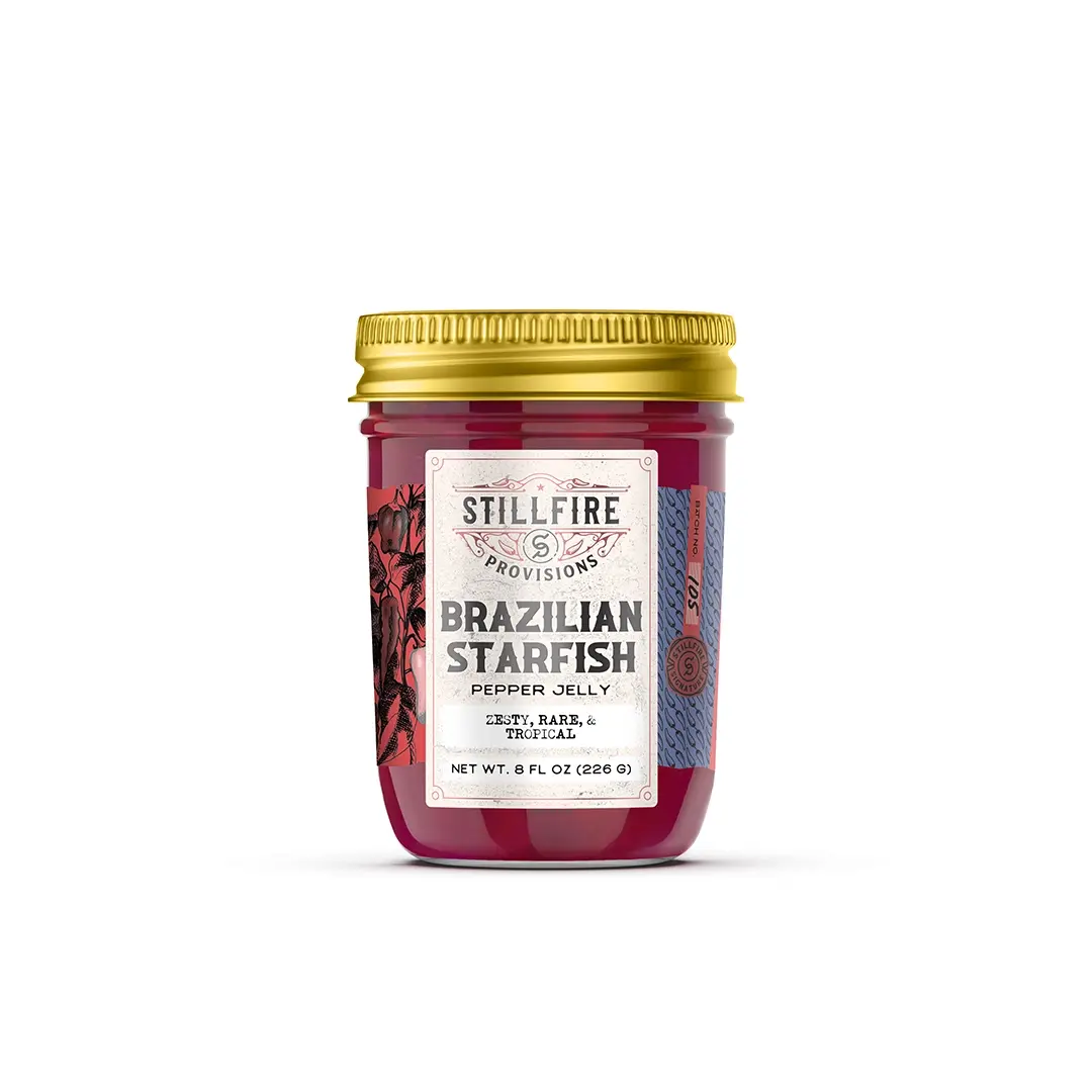 Jar of Stillfire Provisions Brazilian Starfish Pepper Jelly on a white background