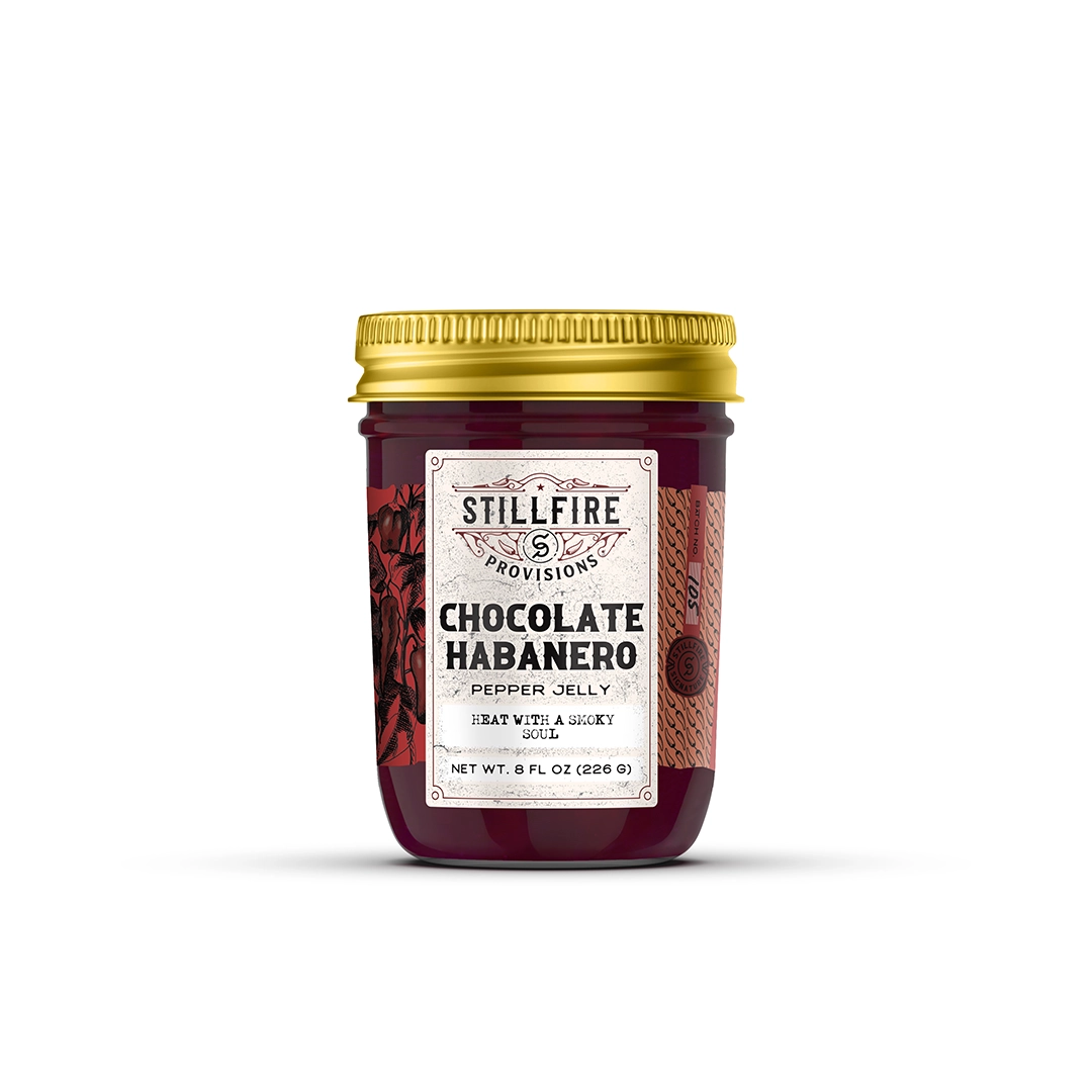 Jar of Stillfire Provisions Chocolate Habanero Pepper Jelly on a white background