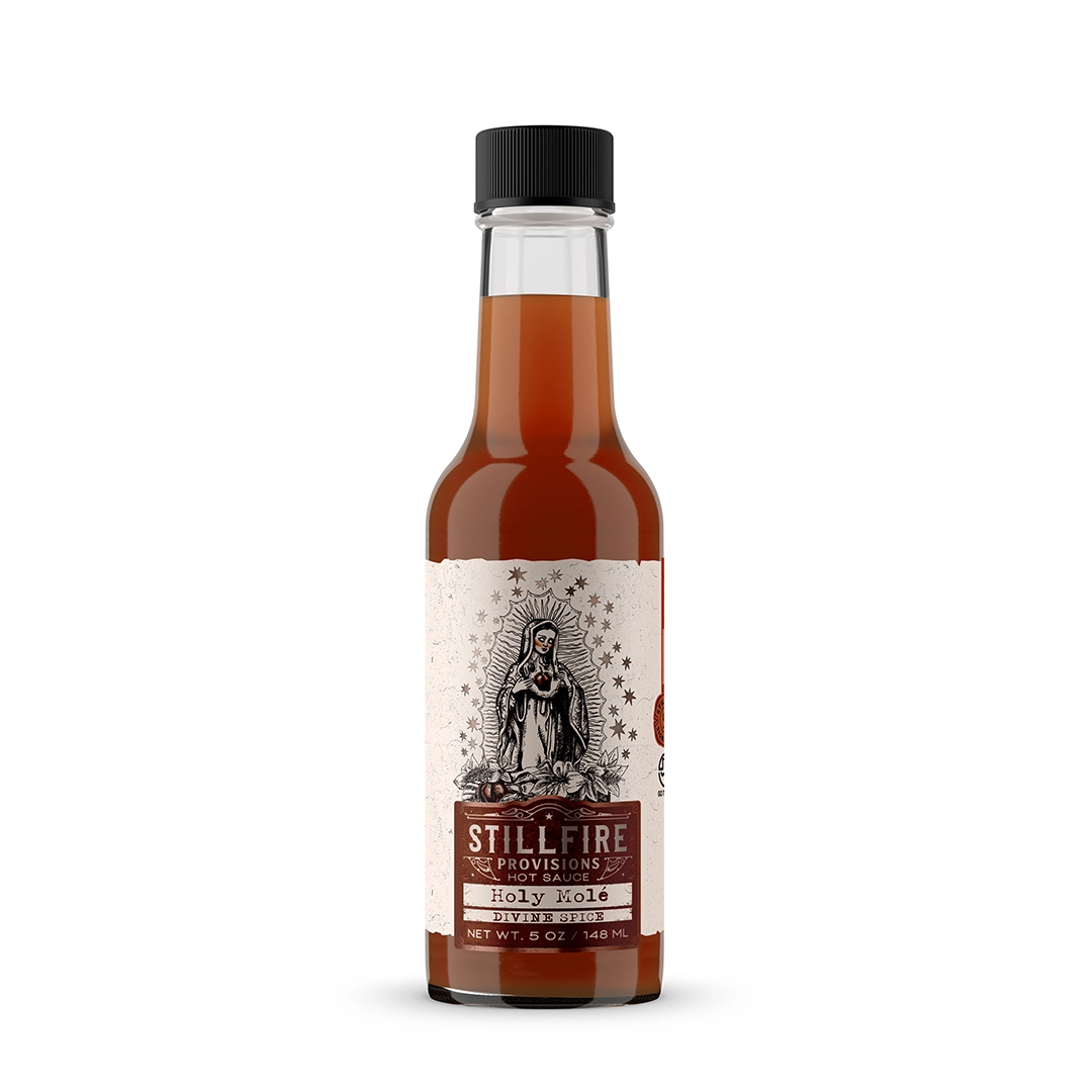 Bottle of Stillfire Provisions Holy Mole sauce on a white background