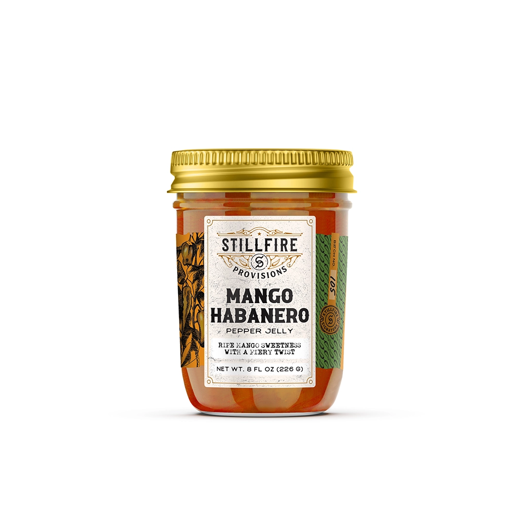Jar of Stillfire Provisions Mango Habanero Pepper Jelly on a white background