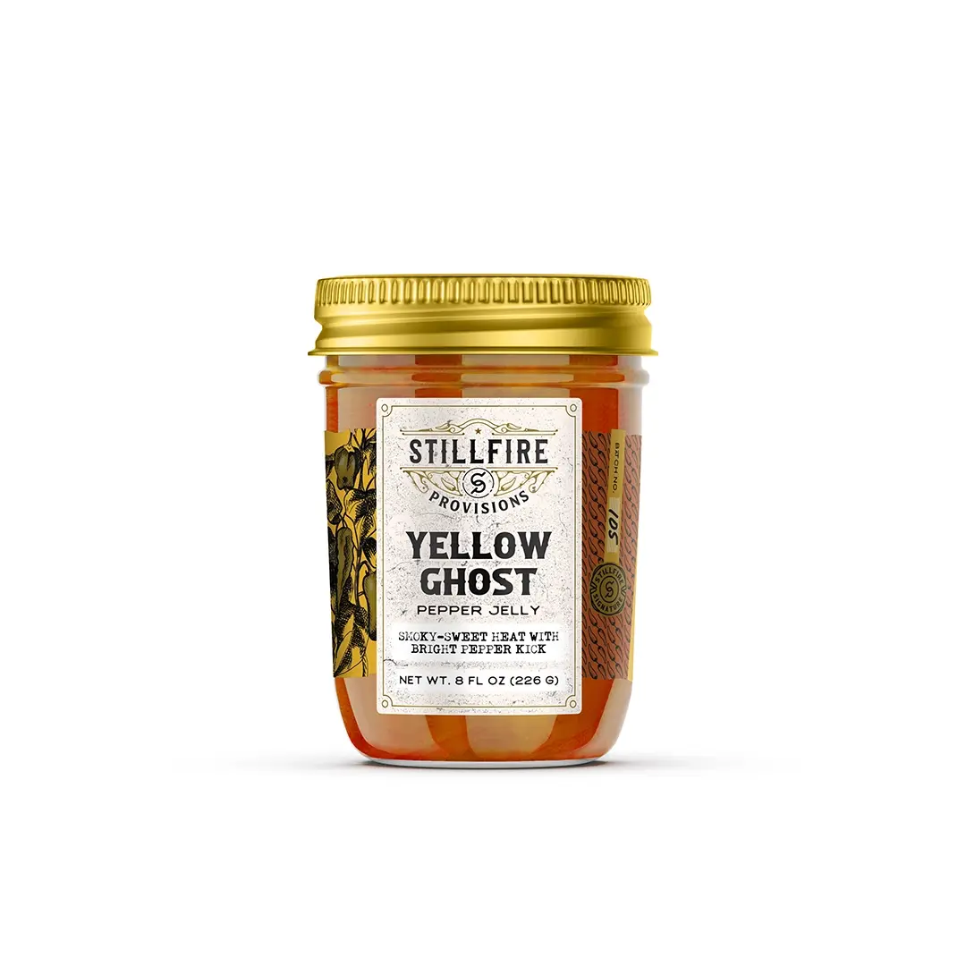 Jar of Stillfire Provisions Yellow Ghost Pepper Jelly on a white background