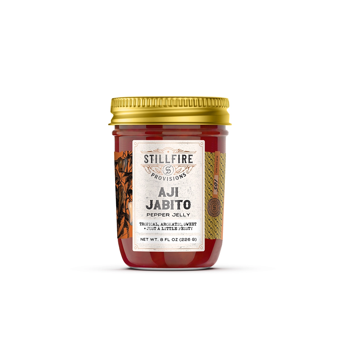 Jar of Stillfire Provisions Aji Jabito Pepper Jelly on a white background
