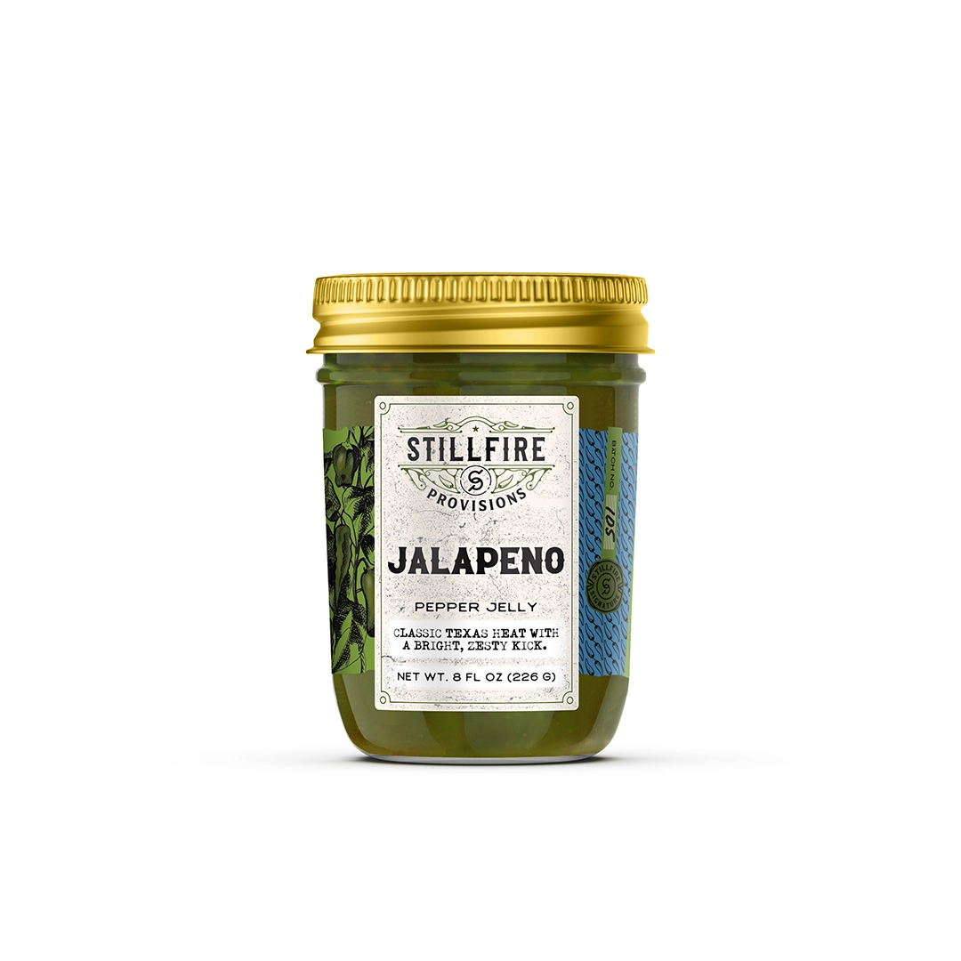 Jar of Stillfire Provisions Jalapeno Pepper Jelly on a white background