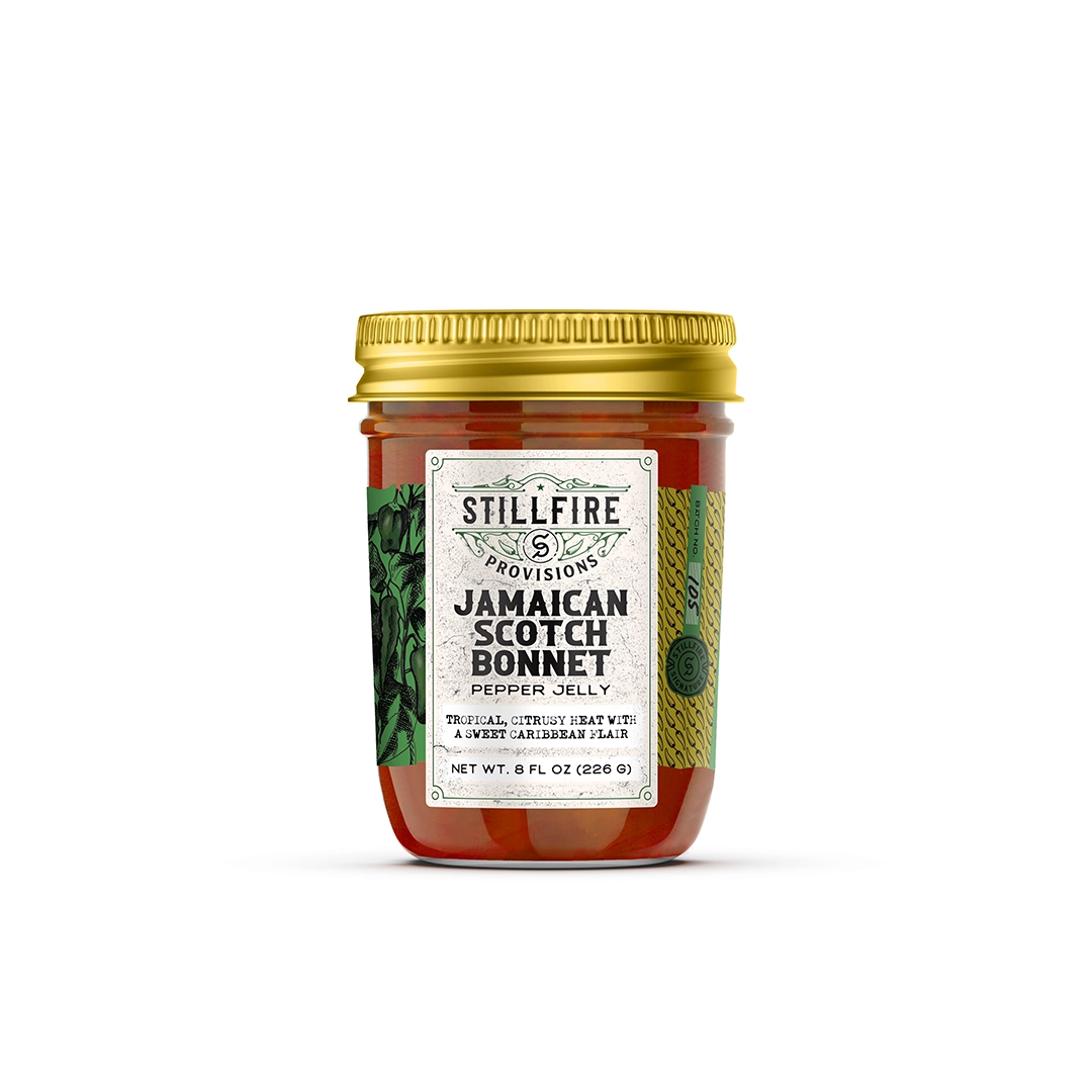 Jar of Stillfire Provisions Jamaican Scotch Bonnet Pepper Jelly on a white background