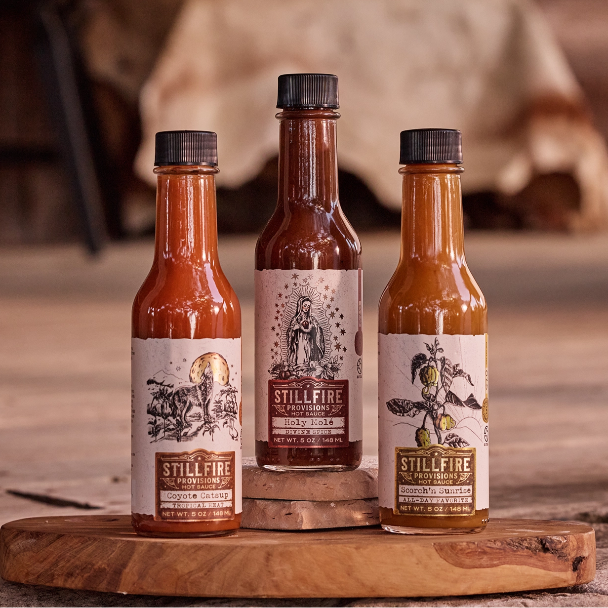 Hot sauces on a wood porch