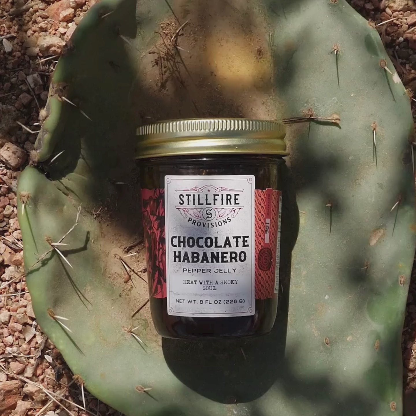 Chocolate Habanero Pepper Jelly by Stillfire Provisions in an antler on the Texas ground 